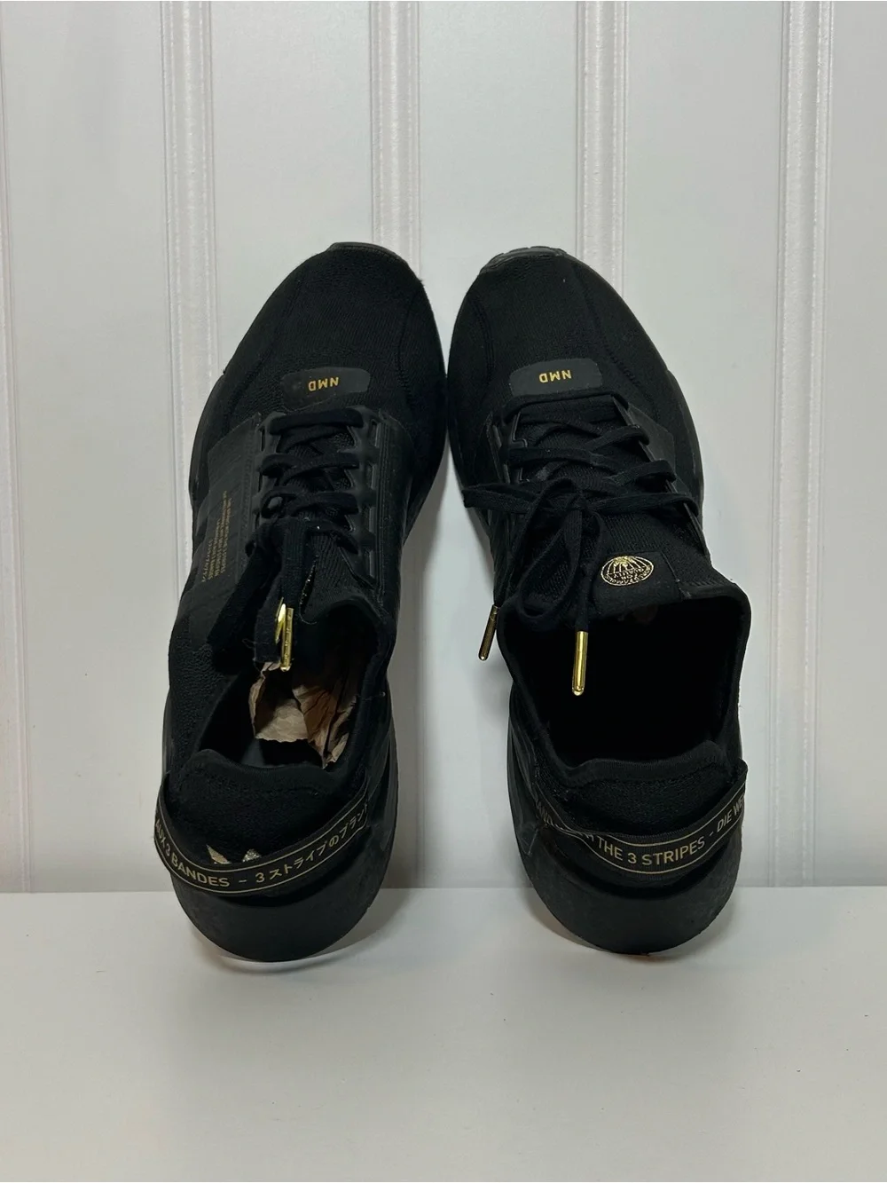 adidas nmd Black Sneakers with Gold Accents